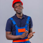 young-african-american-builder-man-wearing-construction-uniform-safety-helmet-applauding-with-confident-smile-face-standing